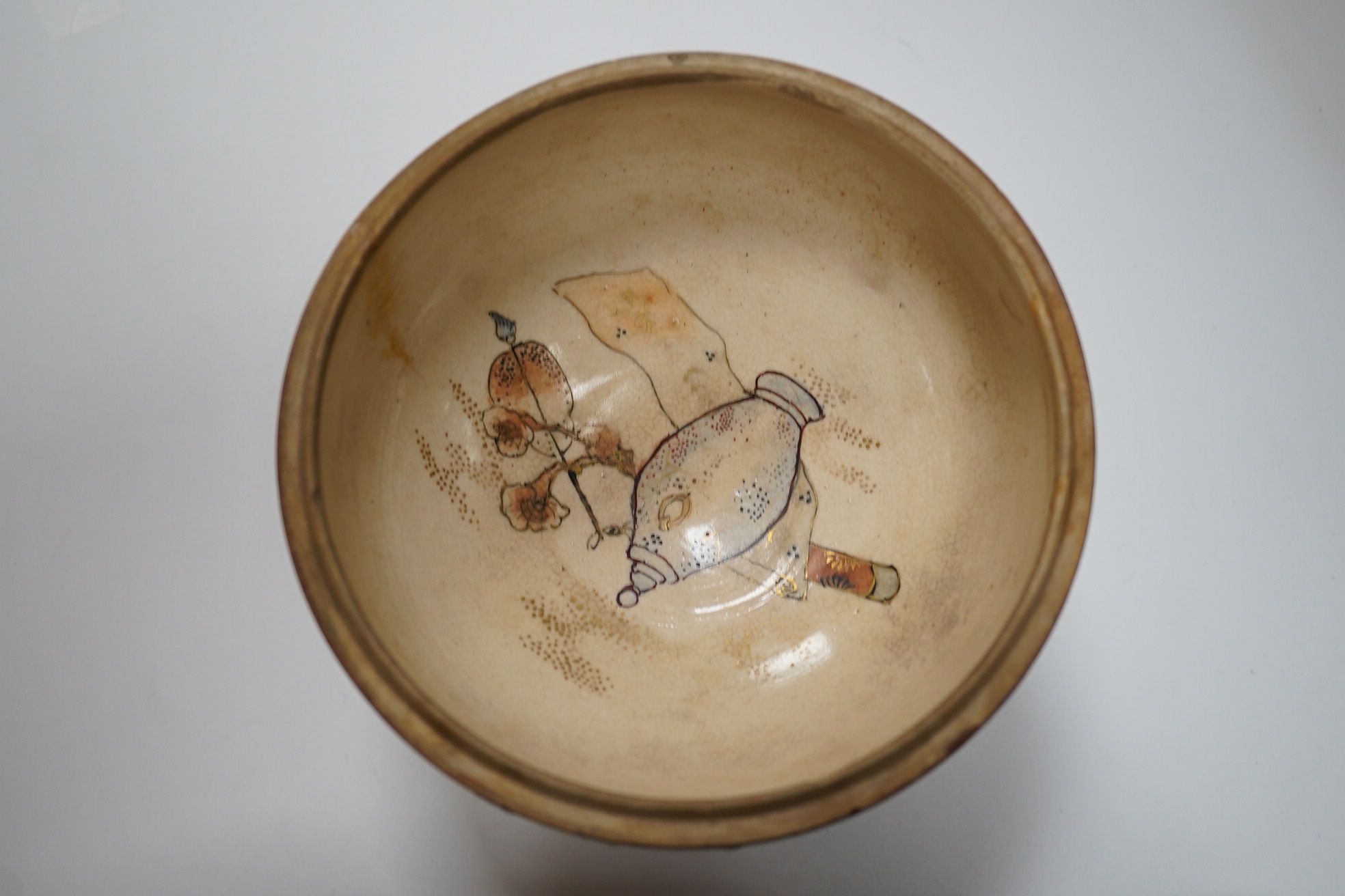 A Japanese Satsuma pottery box and cover on stand, box and cover 14.5cm diameter. Condition - crack to bowl of box and some scratches to surface glazing